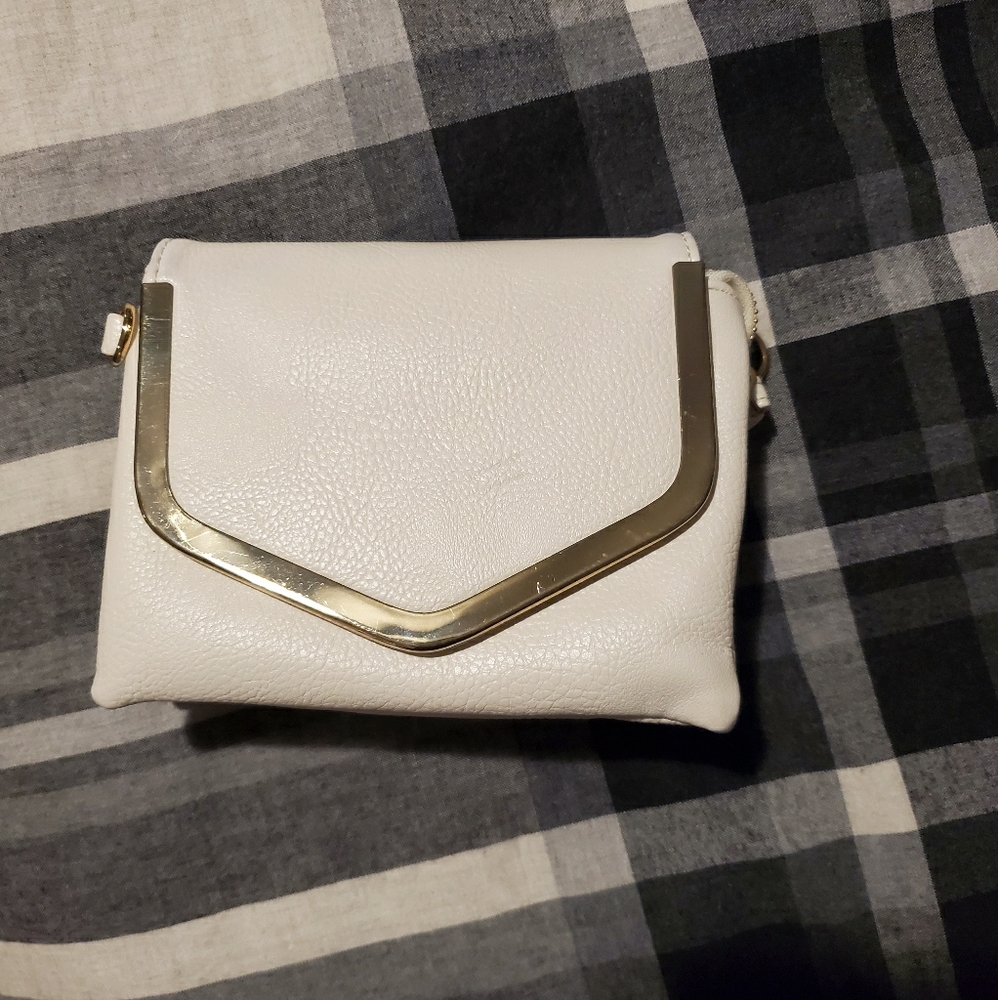 White hand snach purse.